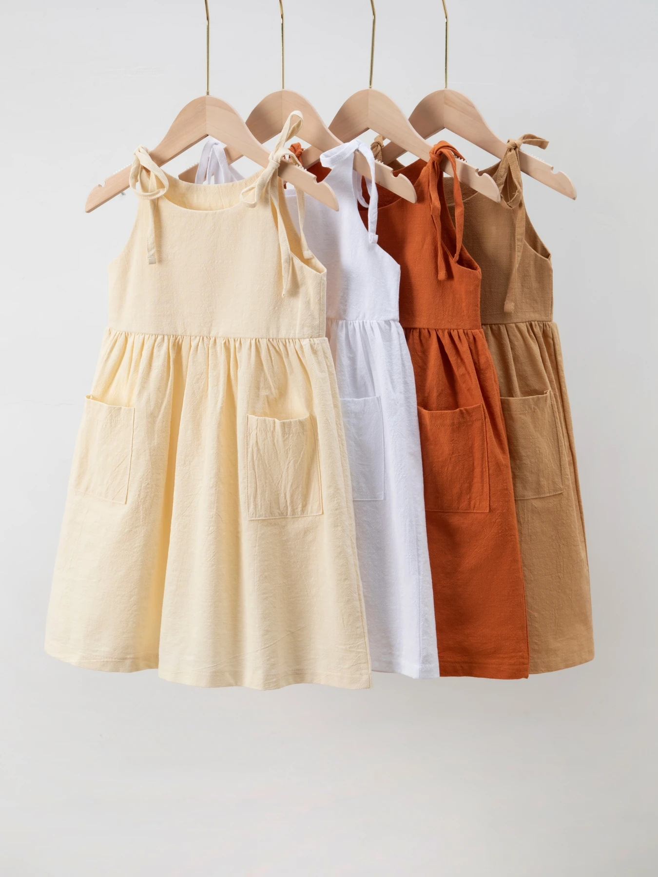 hot sales spring summer fall fashion solid color linen big pocket lace-up slip dress baby girl dress designs