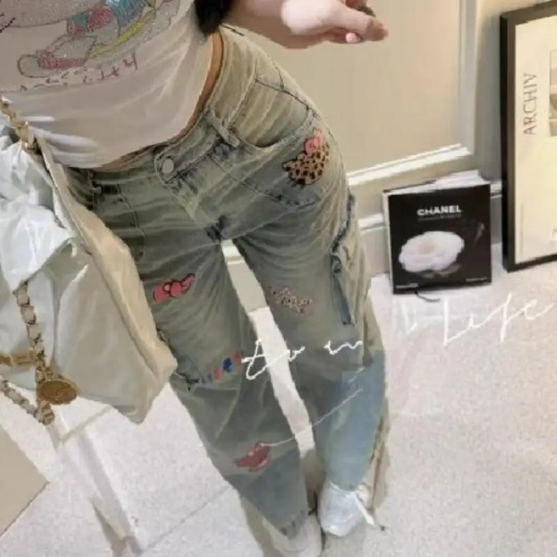Sanrio novo bonito jeans olá kitty jeans estilo americano retro graffiti solto olhar mais fino estudante calças retas menina