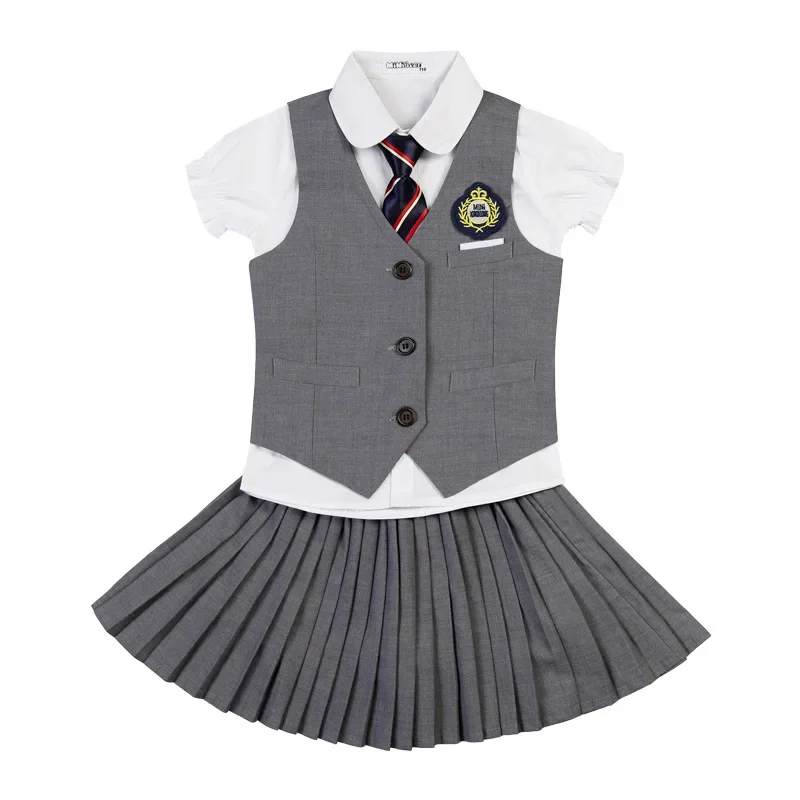 Uniforme scolastica coreana per bambini Ragazzi Ragazze Gonna a pieghe Canottiera Top Set di abbigliamento per prestazioni per bambini Abbigliamento da palcoscenico Uniforme da studente