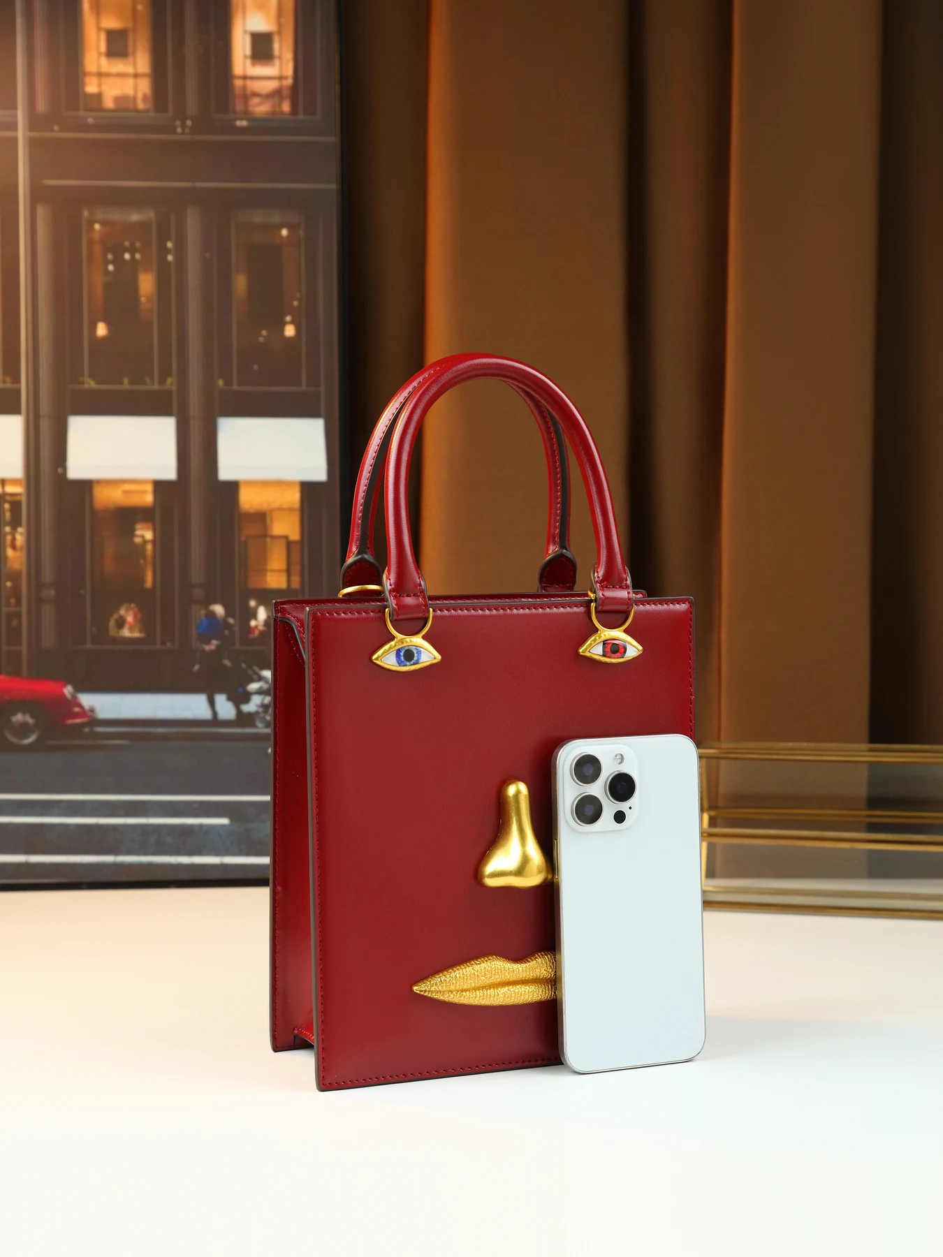 Super fire niche art face handbag three-dimensional metal facial design retro high-end women's bag