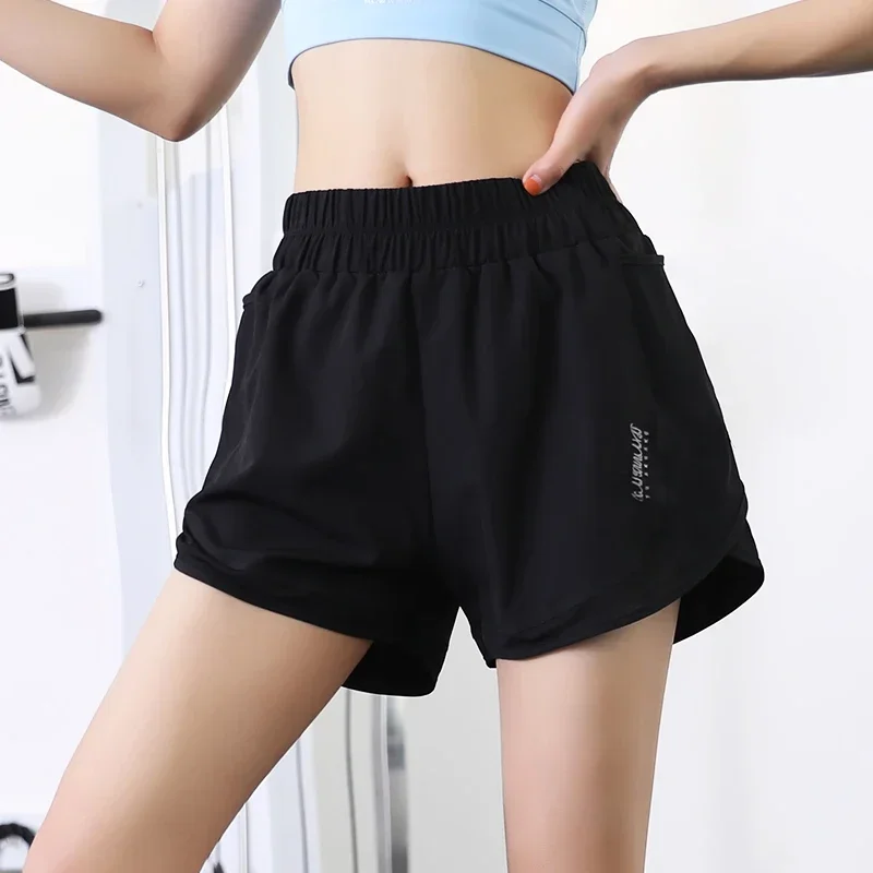 Quick drying shorts anti naked running training outdoor vacation two pieces of net fitness pocket women's sports shorts