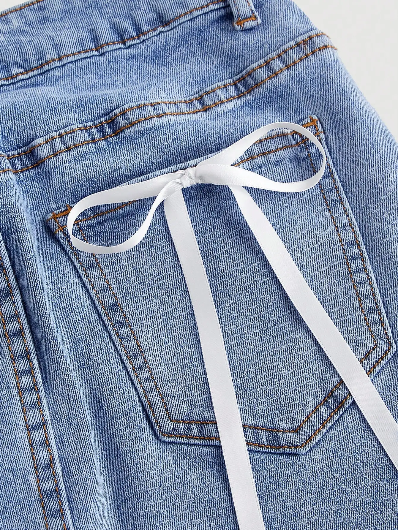 Women's High-Waisted Denim Mini Skirt with Ribbon-Tie Back Pockets