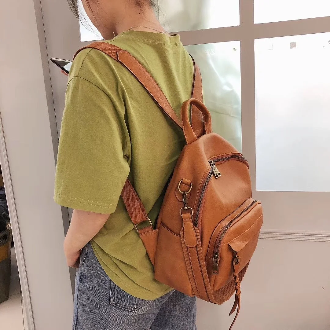 Leather backpack women\'s new top layer cowhide women\'s backpack solid color student bag fashion middle bag