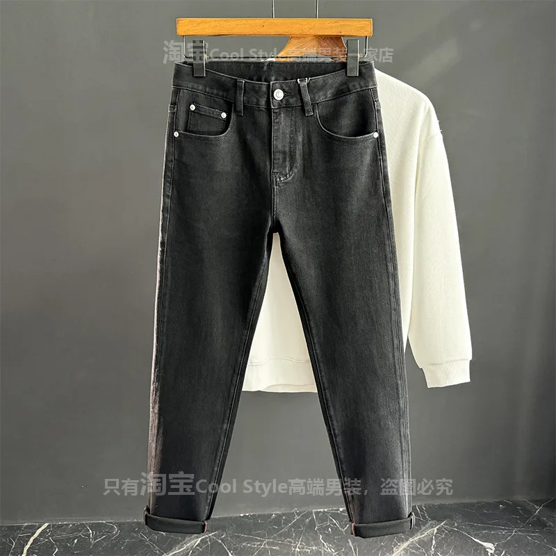 

Autumn high-end minimalist black jeans men's slim fit small feet light luxury fashion stretch denim 2026 new pants