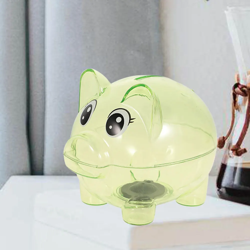 クリエイティブな豚の形をした貯金箱 子供用の透明なコイン収納 プラスチック製の装飾品 プラスチック製の貯金箱 透明な貯金箱