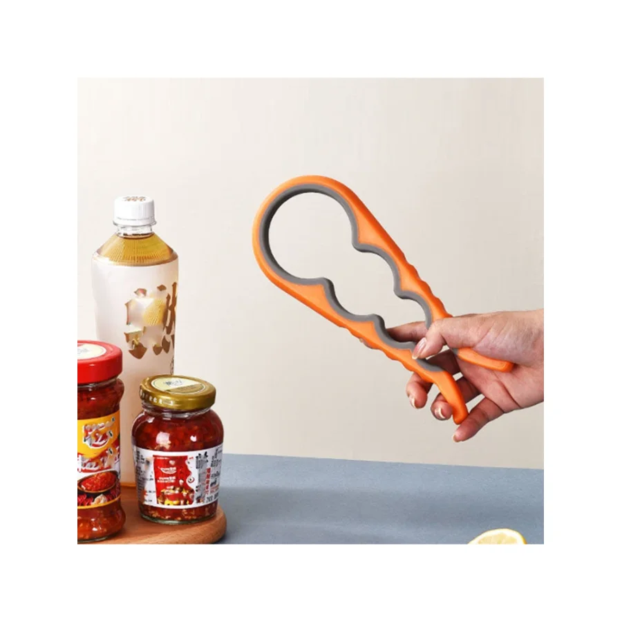 

Multifunctional 4-in-1 Kitchen Tool Jar Gripper Lid Opener Can Opener Bottle Opener - Easy to Use Home Essential