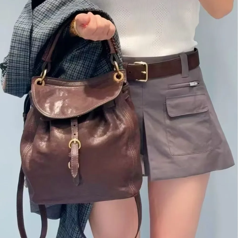Autumn and Winter Niche Design Retro Flip Backpack Female Coffee Versatile bag Commuter Portable High-end Sense Female Fashion