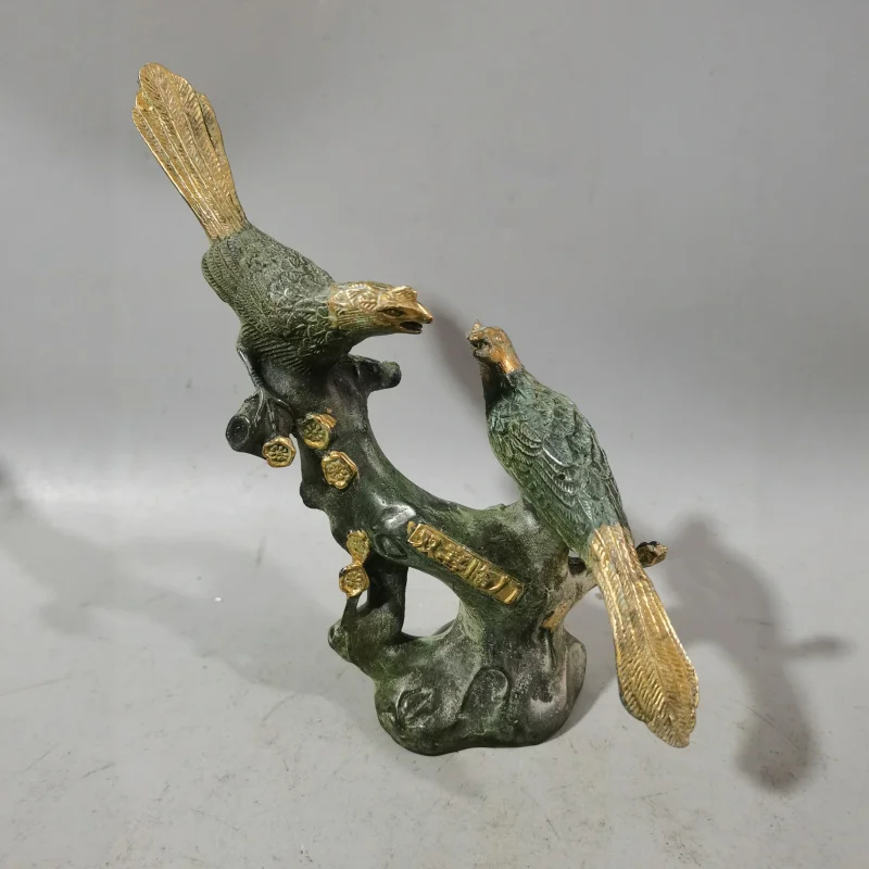 

Gilded magpie perching on a branch ornament, symbolizing joy and happiness, a home craft decoration
