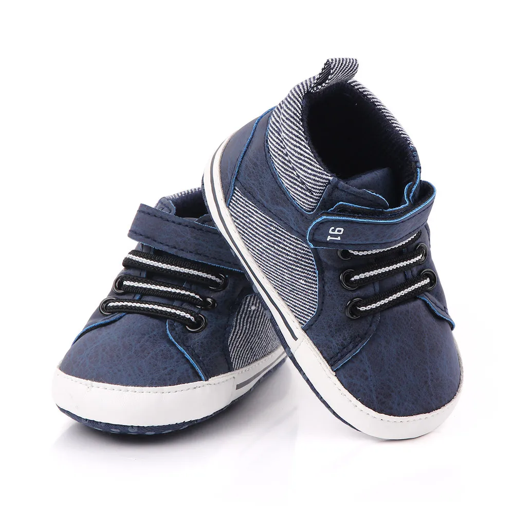 Zapatos de cuna de marca para bebés, artículos para niños, botines, entrenadores de cosas para recién nacidos, zapatillas de cuero suave para niños