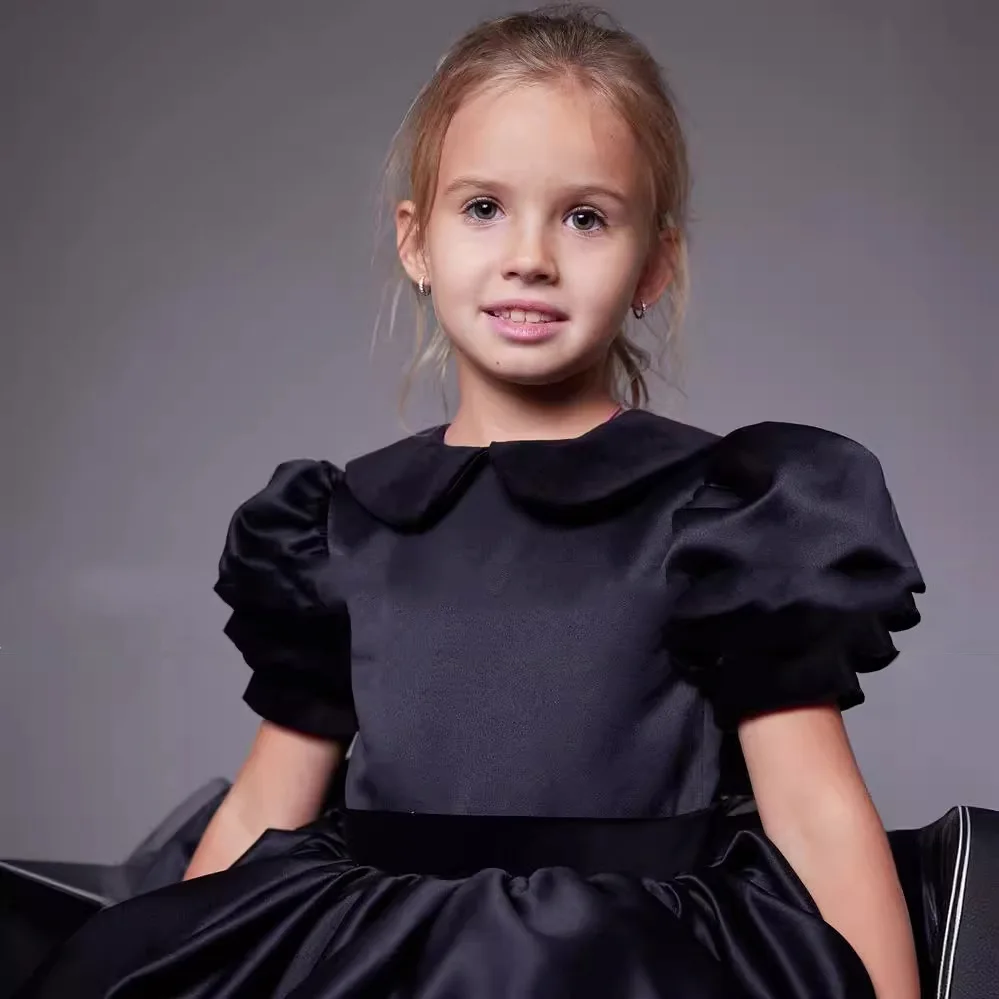 

Jill Wish M041Black Satin Flower Girl Dress with Puffed Sleeves & Peter Pan Collar – Layered Tulle Skirt for Pageants