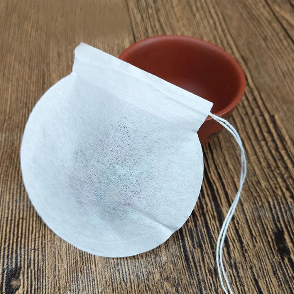 

100pcs Disposable Round Wood Pulp Filter Paper Coffee Tea Bag Tea Pouch for Loose Leaf Tea Powder (6cm White)