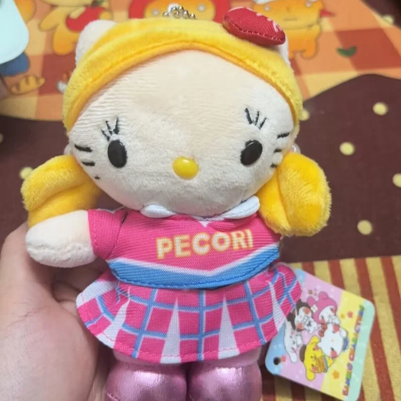 

Sanrio Hello Kitty Yellow Hair Long Eyelashes Cheerleading Team Dance Kt Plush Toy Cute Car Keychain Decoration Backpack Pendant