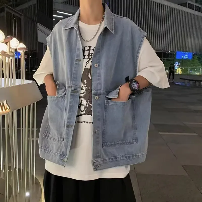 

Men Sleeveless Denim Vest Summer New Korean Casual Loose Lapel Coats Fashion Versatile Single Breasted Blue Pockets Solid Tops