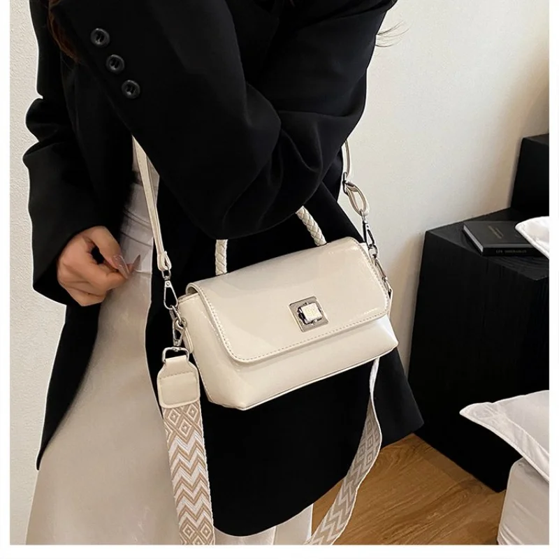 

Elegant Women Bag With Frame Closure And Top Handle Made From Exotic Embossed Leather For Luxury Fashion