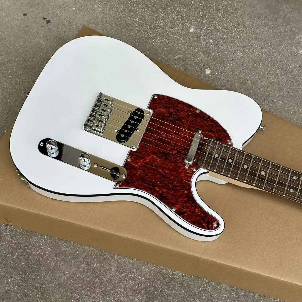 NEW White TL guitar, red pearl guard, maple fingerboard, Black binding view 2