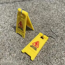 1 pair of warning words foldable earrings special novelty funny  CAUTION WET FLOOR