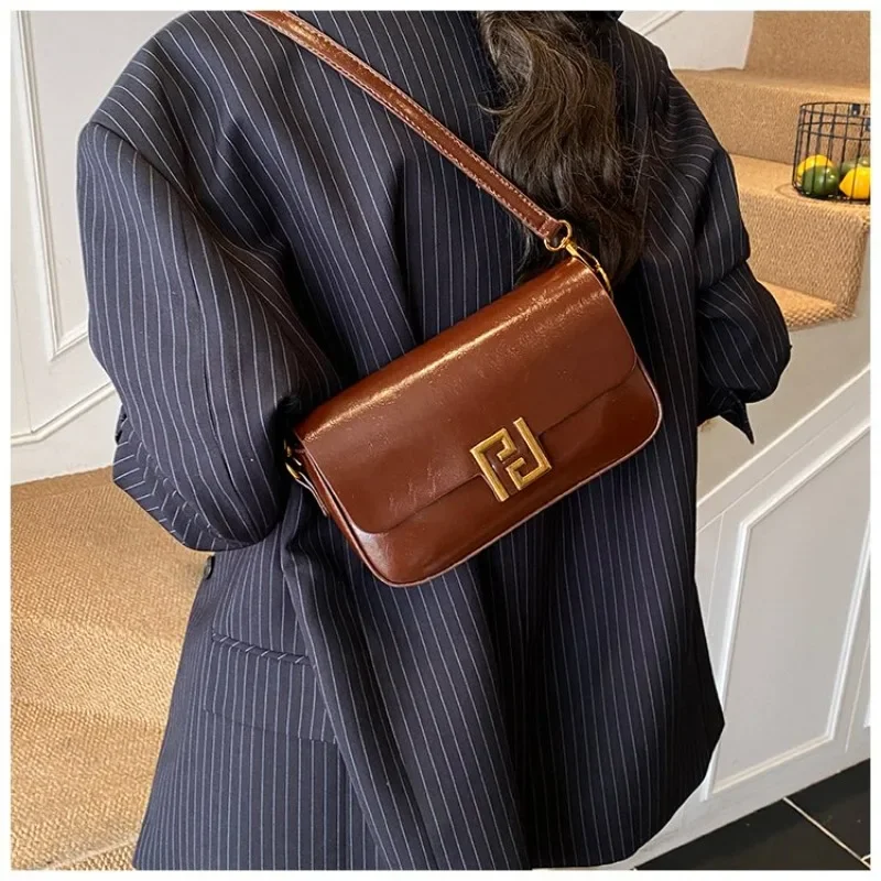 

Luxury Brand Handbag Simple Yet Stylish Also A Perfect High-End Diaper Bag For The Discerning Modern Woman