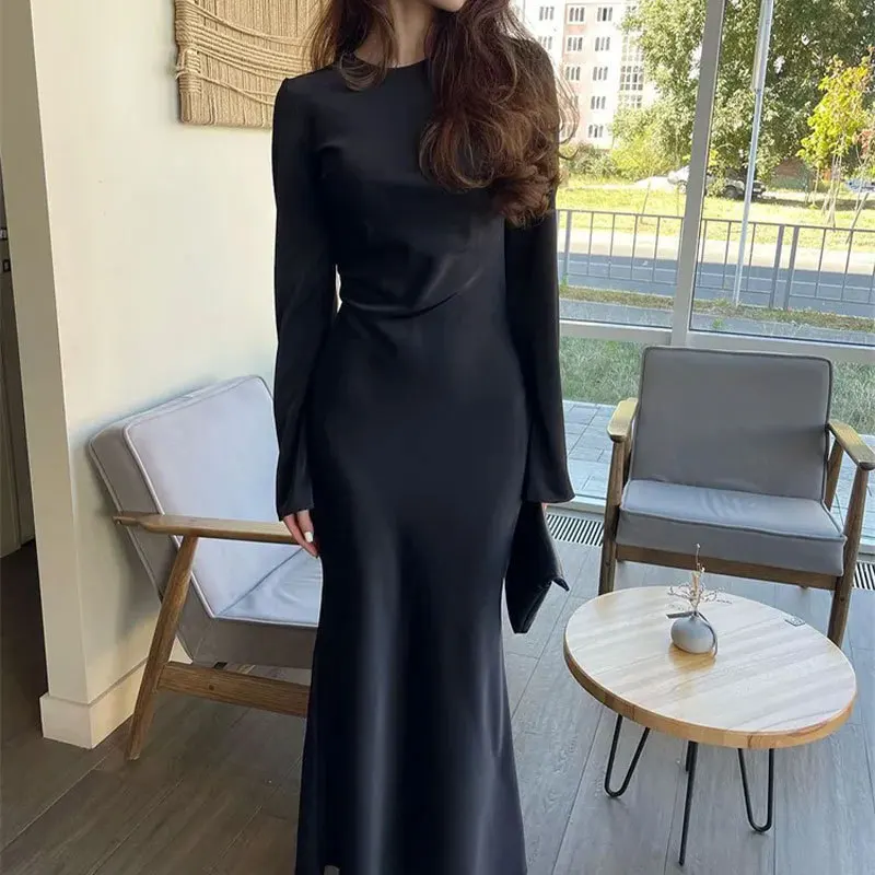 

Women's long sleeved solid color round neck elegant tight fitting long sleeved commuting style slim fit hip hugging dress