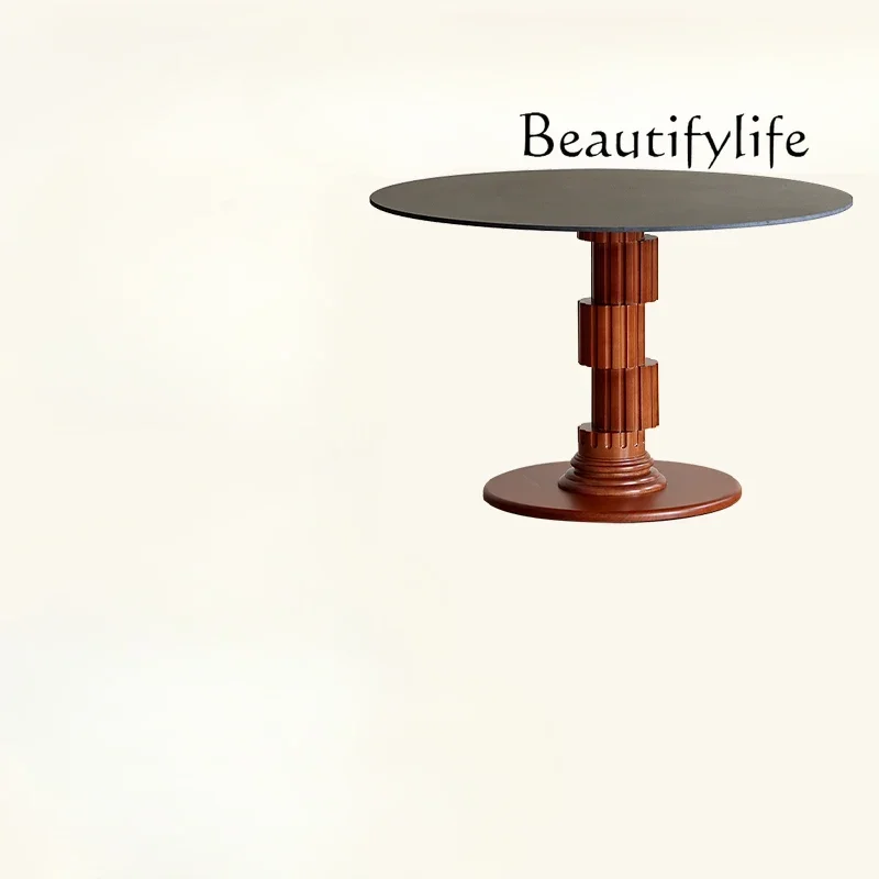 Light luxury Nordic retro solid wood dining table home round table designer simple Roman column rock slab high sense