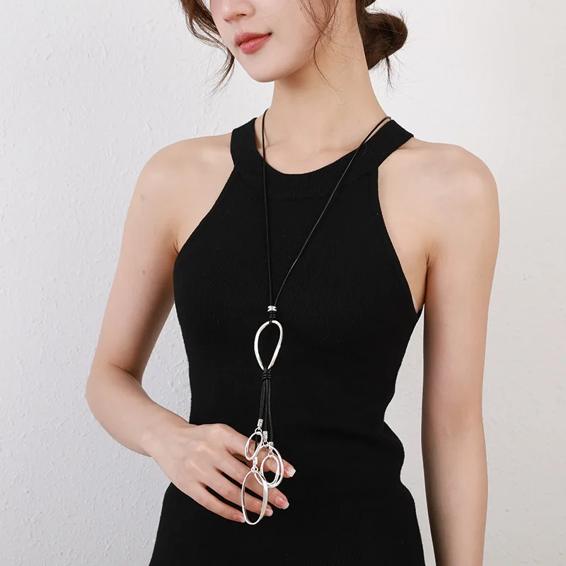 Sweater chain women's Korean version fashion leather long hot-selling exaggerated necklace ins high-end long neckla