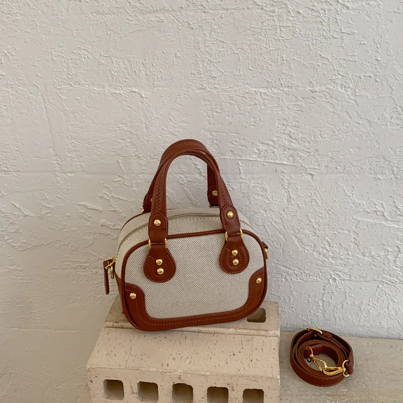 

Новая сумка в корейском стиле из натуральной кожи с верхней ручкой, повседневная и простая сумка через плечо, модная и универсальная женская сумка для поездок на работу.