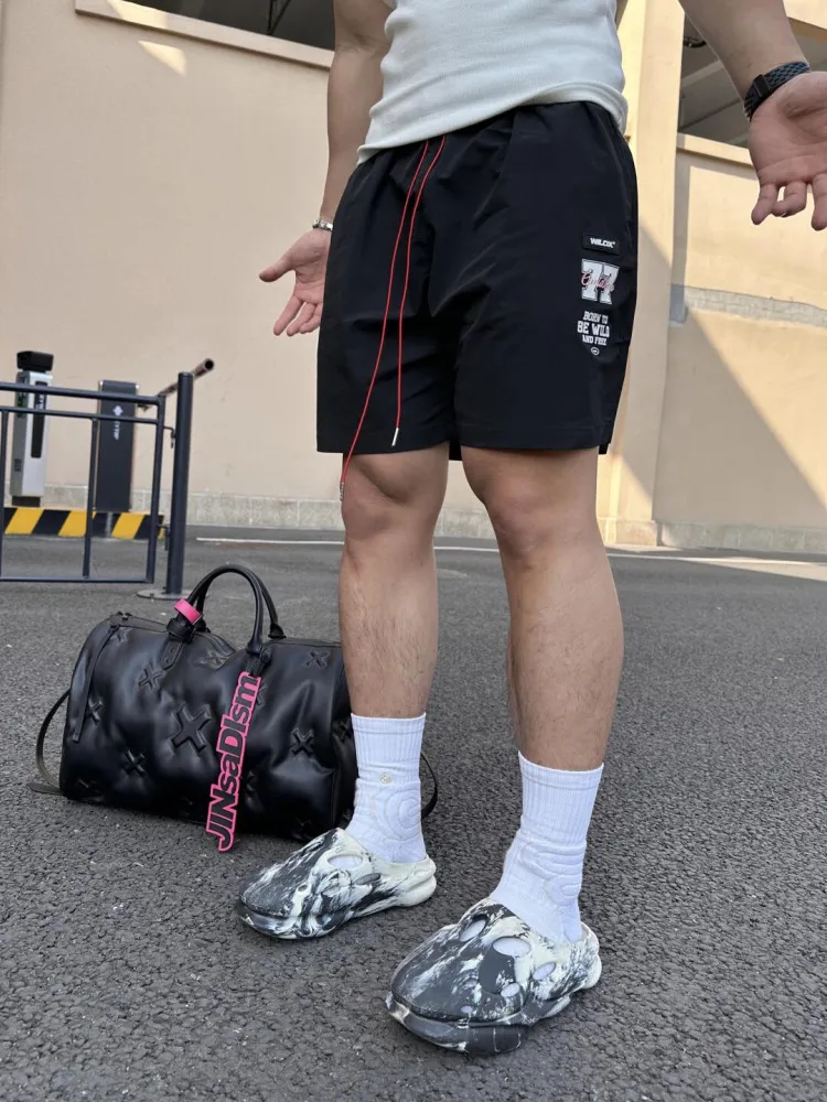 

Легкие летние брюки для мужчин в стиле американского баскетбола, свободного кроя, с принтом-надписью, повседневные...