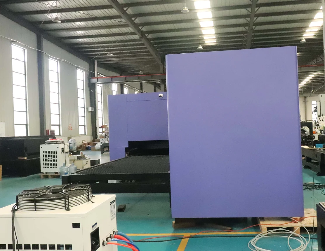automatic loading and unloading fiber laser cutting machine enclosed cover with dual table exchange table