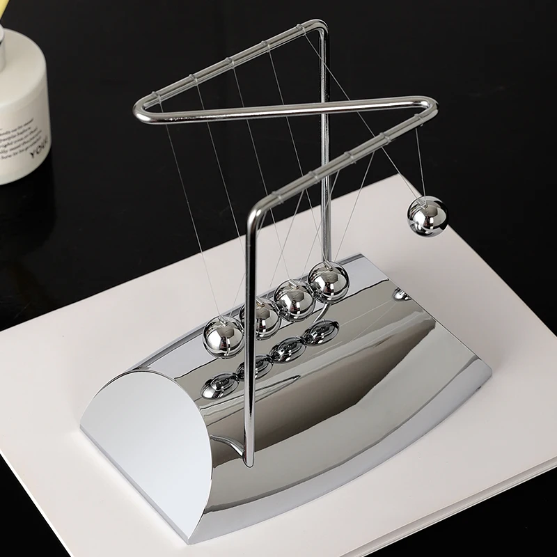 

Permanent moving ornament, Newton pendulum men, study office desktop decoration, creative wine cabinet light luxury high-end