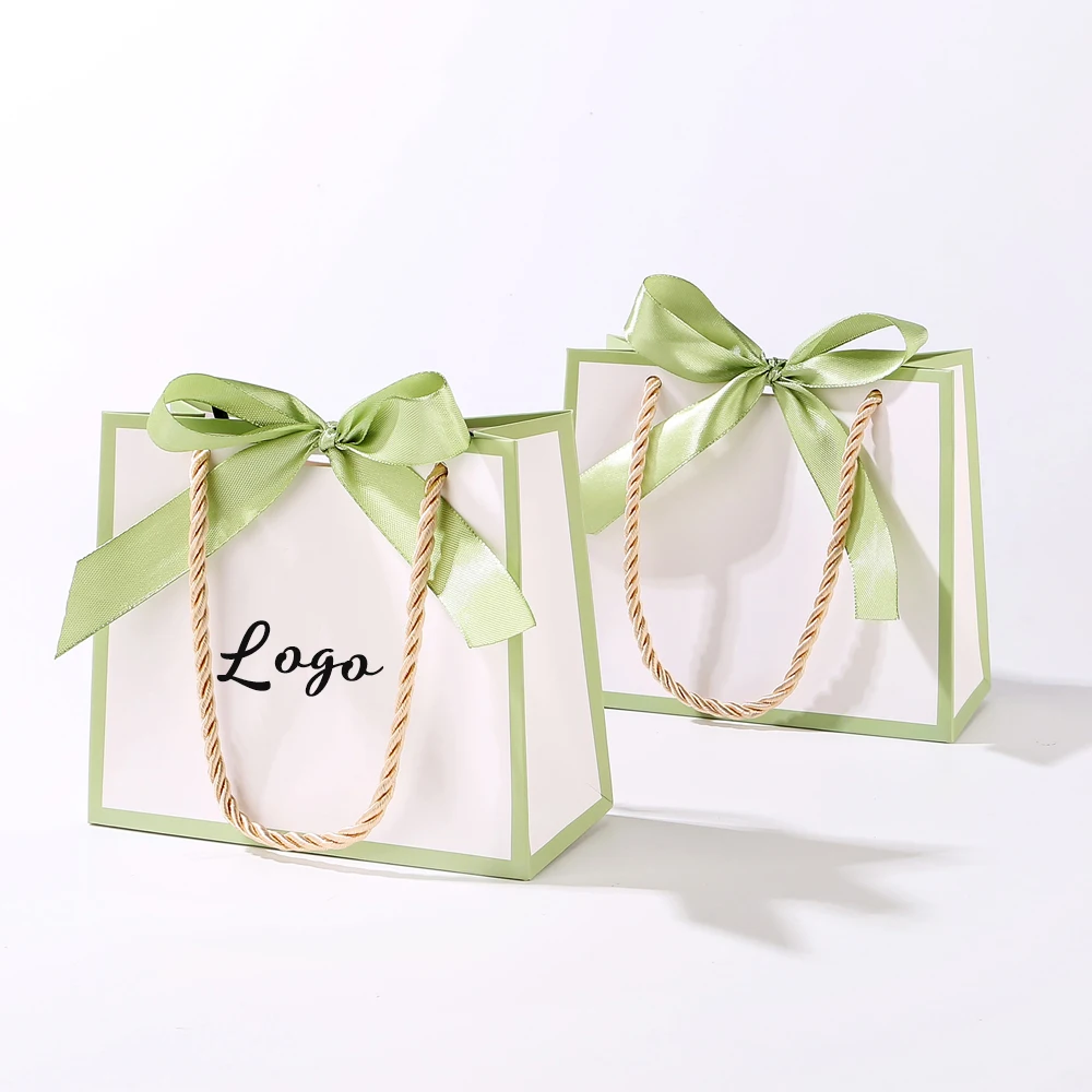 

Custom Logo Paper Wedding Gift Bag for Jewelry Present Shop Promotion Boutique Shopping Bag With Handle and Bow for Souvenir