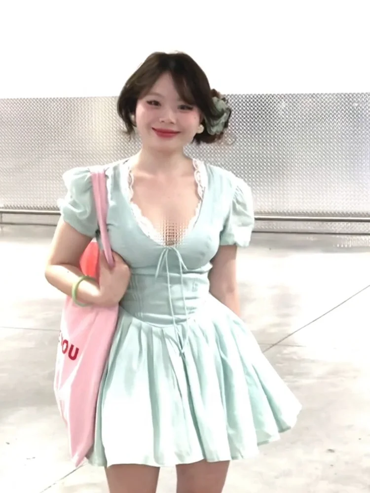 

XZY Xinzhengyan Mint Wave een V-ne Dr женские большие размеры летний пляжный Vaion Princ Dr корейский Sle Bubble Sve