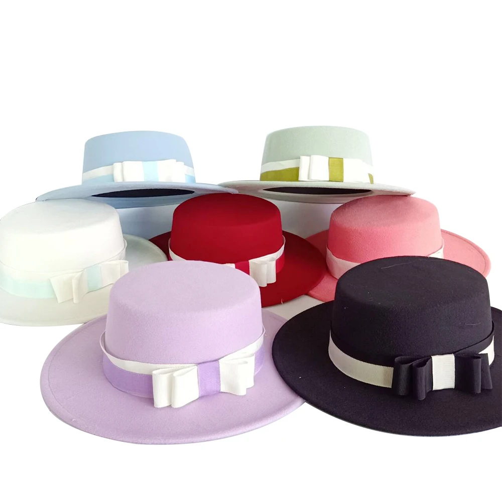 

New women's autumn and winter Korean retro jazz hat color matching bow style fashion fedora top hat street shot sombrero
