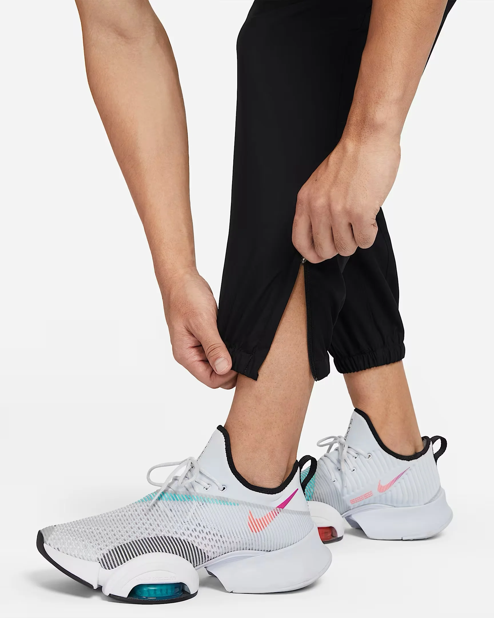 بنطال رياضي محبوك أسود للرجال من Nike Dri-Fit مطبوع بأساور قابلة للتنفس، تصميم شعار العلامة التجارية، بنطال كاجوال للتمرين