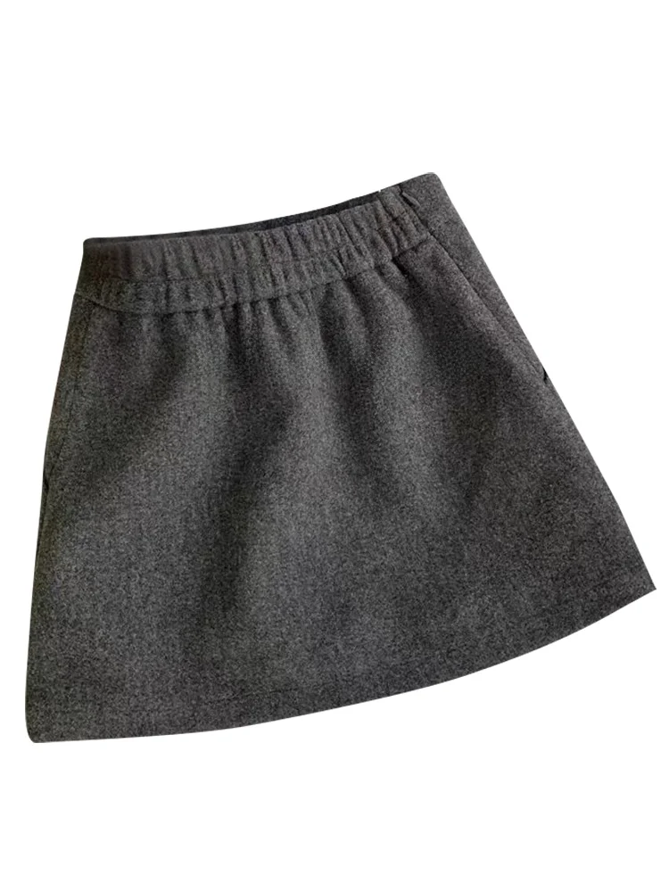 Falda de lana a la moda para mujer, cintura alta, corte en A, corta, que evita la exposición, para otoño e invierno, estilo coreano.