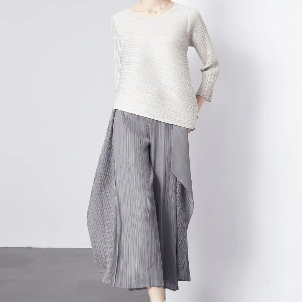 

Женский модный костюм, летний топ нестандартной формы, свободные широкие брюки, плиссированный комплект из двух предметов, элегантный повседневный наряд