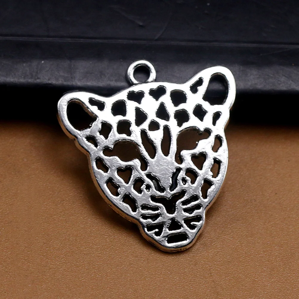 Abalorio colgante de aleación, fabricación de joyas, dijes DIY, cabeza de leopardo ahuecada, 20 piezas