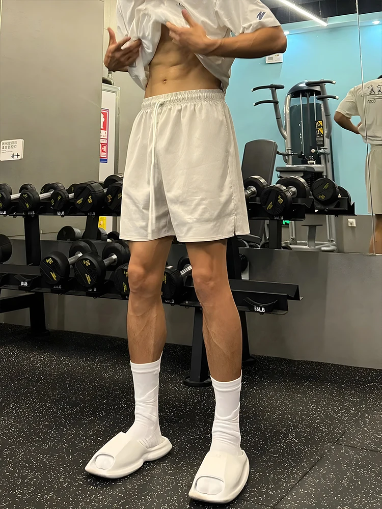 

Мужские спортивные штаны American Slim Fit, летние, модные, для баскетбола, для активного отдыха, до колена, быстросохнущие, из четырехслойной ткани...