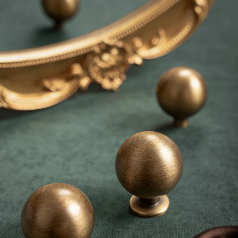 Round antique brushed brass cabinet knob — supplier illustration 2
