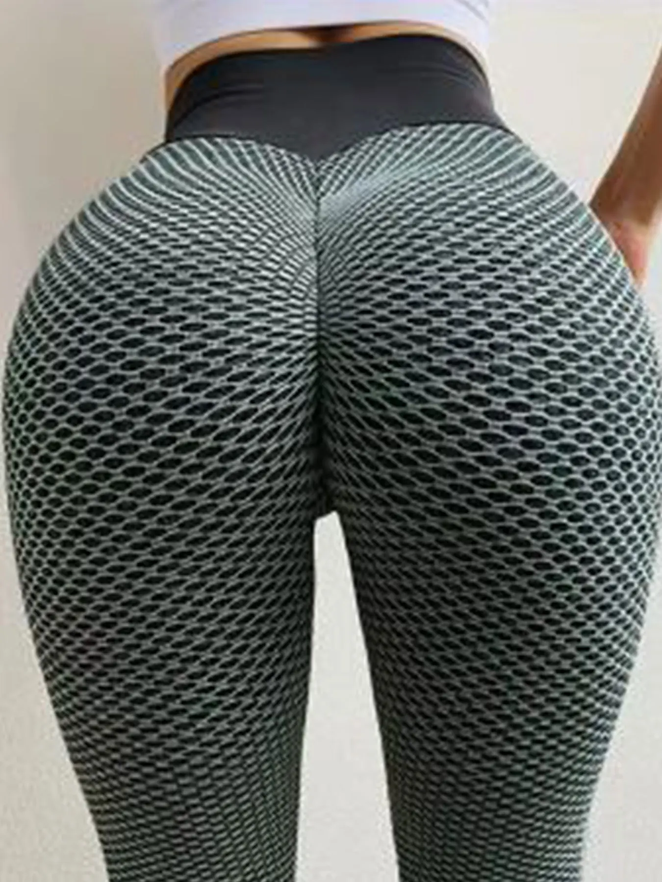 Sports leggings jacquard honeycomb bubble yoga pants women\'s European and American high waisted and hip lifting tight pants