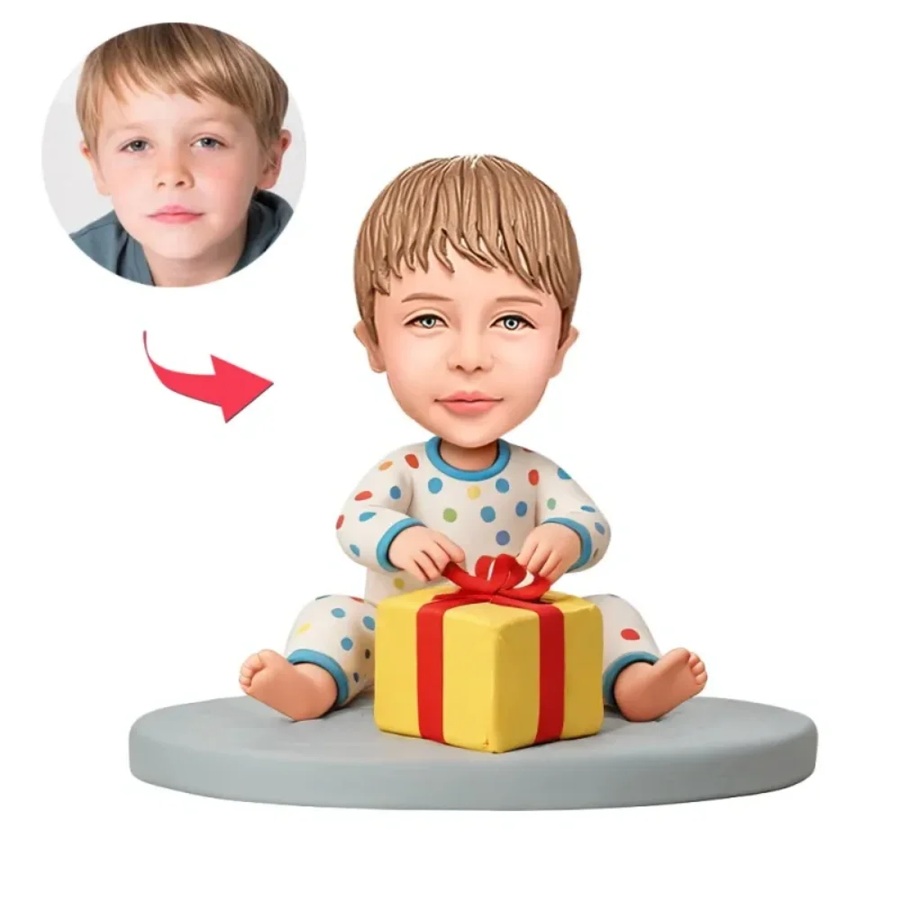Custom Child in Colorful Polka-dot Pajama Set Sitting While Holding Gift Box Custom Bobblehead With Engraved Text Gift