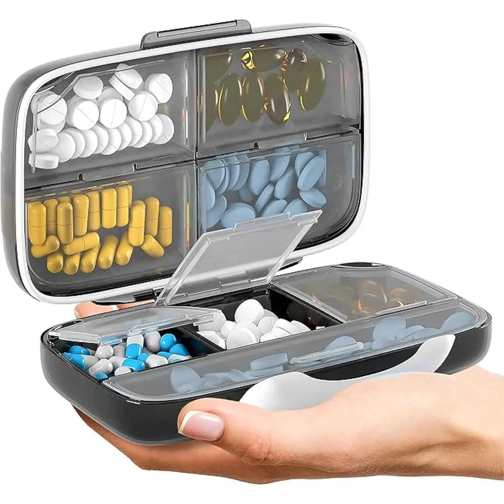 

Portable 8-Compartment Travel Pill Organizer with Labeled Vitamin Container for Medications and Supplements (Black)
