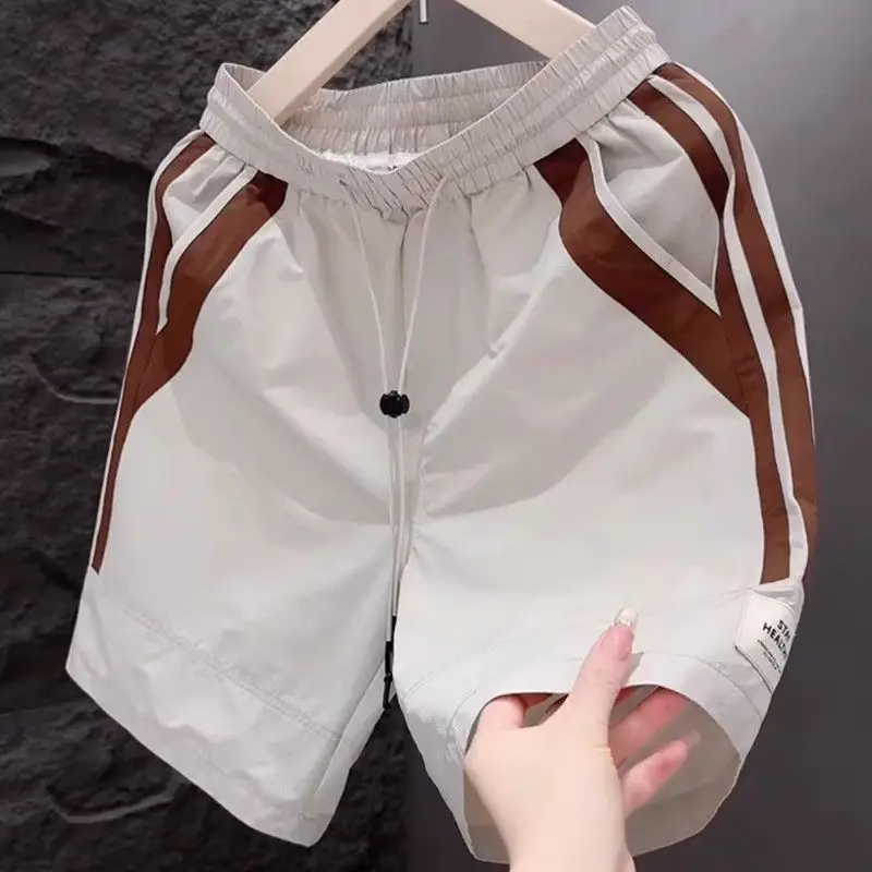 

Новые шорты, мужские летние модные контрастные цвета, быстросохнущие спортивные средние брюки, мужские свободные пляжные брюки с пятью точками