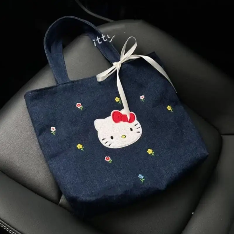 

Sanrio Kawaii Anime 2024 New Cute Student Hello Kitty Embroidered Handbag Makeup Bag Cowboy Office Handbag Portable Tote Bag