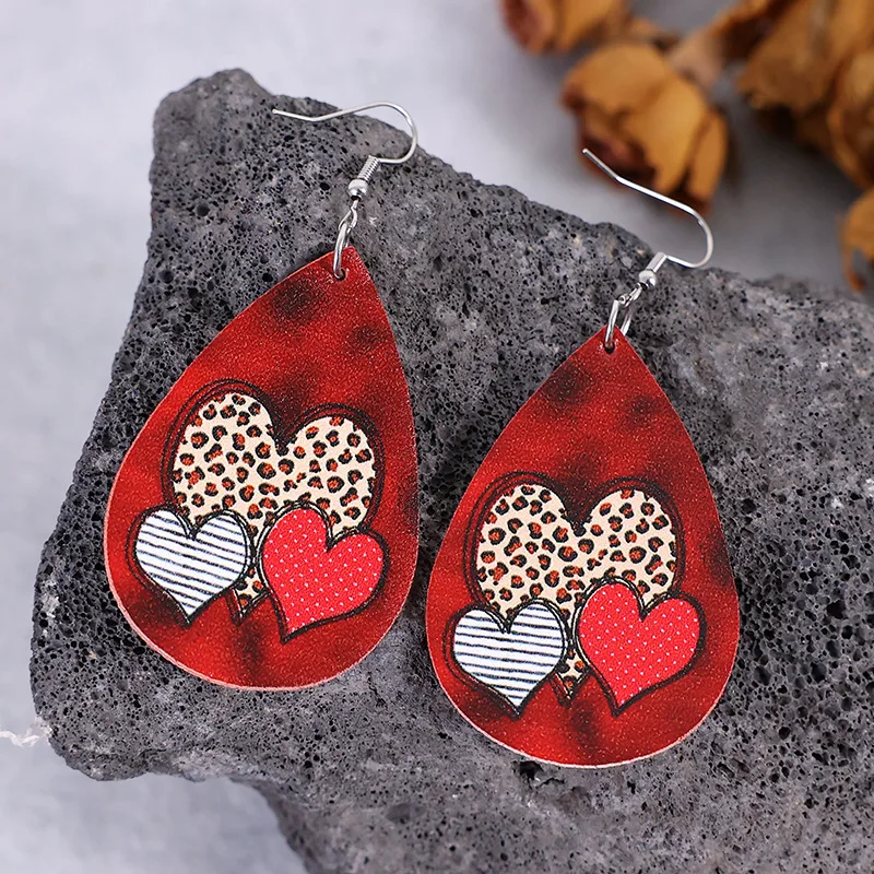 New Valentine's Day leather earrings, retro water drop-shaped leopard print peach heart earrings, double-sided leather earrings.