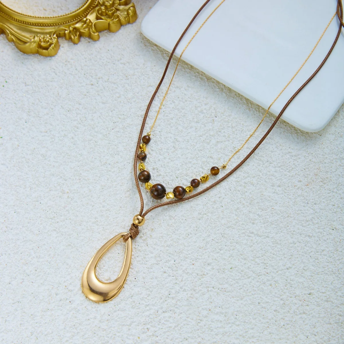 Vintage Maillard Halskette mit natürlichen Tigeraugen-Perlen, Sonnen- und ovalen Anhängern, für Damen und Herren, im ethnischen Stil, mit Blumen- und Kristallmotiven, lange Choker-Kette. – Detail 28