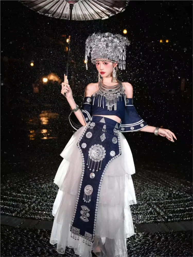

A full set of ethnic style photos featuring deep blue strapless ribbon long dress hat and necklace