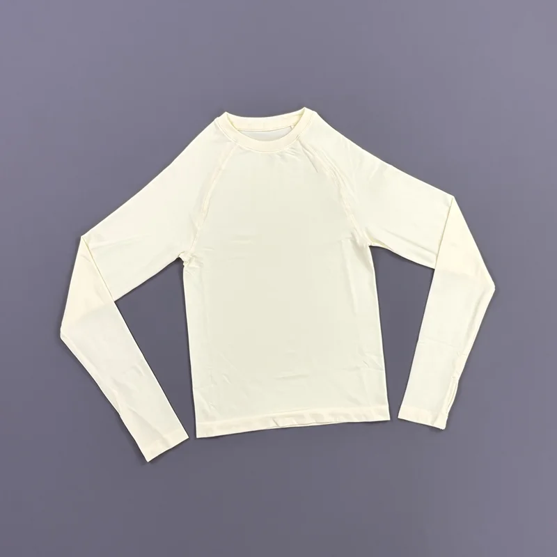 HISTELLO Defy Langarm-Workout-Top für Damen, Nahtloses Gym-Sportshirt mit Daumenlöchern, Slim Fit Sportshirt für Laufen, Yoga und Fitness – Detail 23