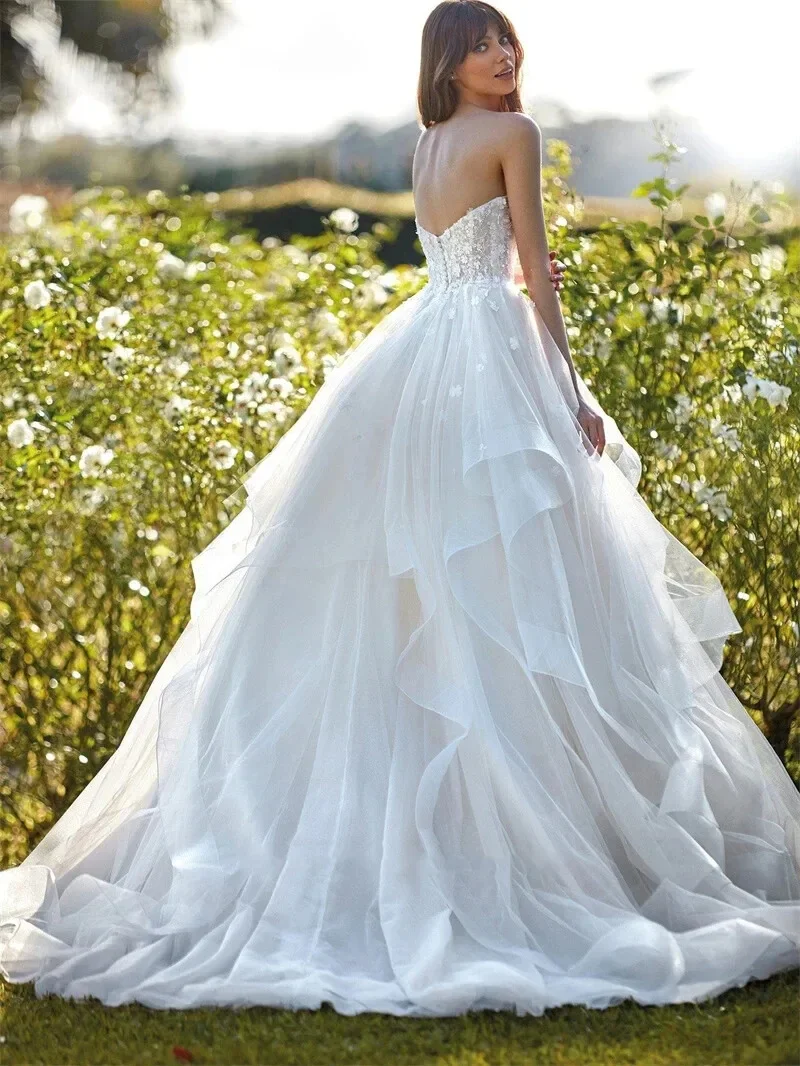 Flavinke personalizado elegante Sexy Sweetheart A-Line vestidos de novia Apliques de encaje Bohemia sin mangas vestidos de novia de tul