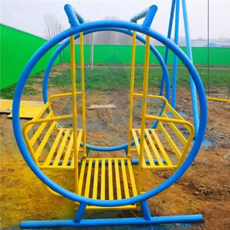 

Play in the outdoor park and ride a metal rocking chair