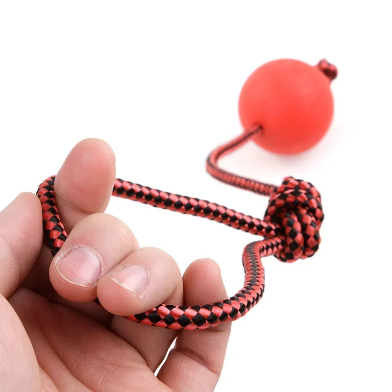 Bola de entrenamiento de goma sólida para masticar perros, juguetes para limpiar los dientes, pelota para masticar para cachorros, juego de mascotas, juguete de entrenamiento para masticar con mango de cuerda
