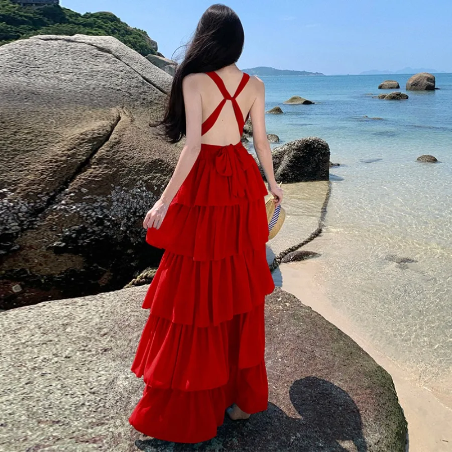 

Европейское и американское женское платье в стиле сексуального пляжного отдыха: глубокое V-образное вырезающееся платье с открытой спиной, на бретельках, длинное, многоярусное.